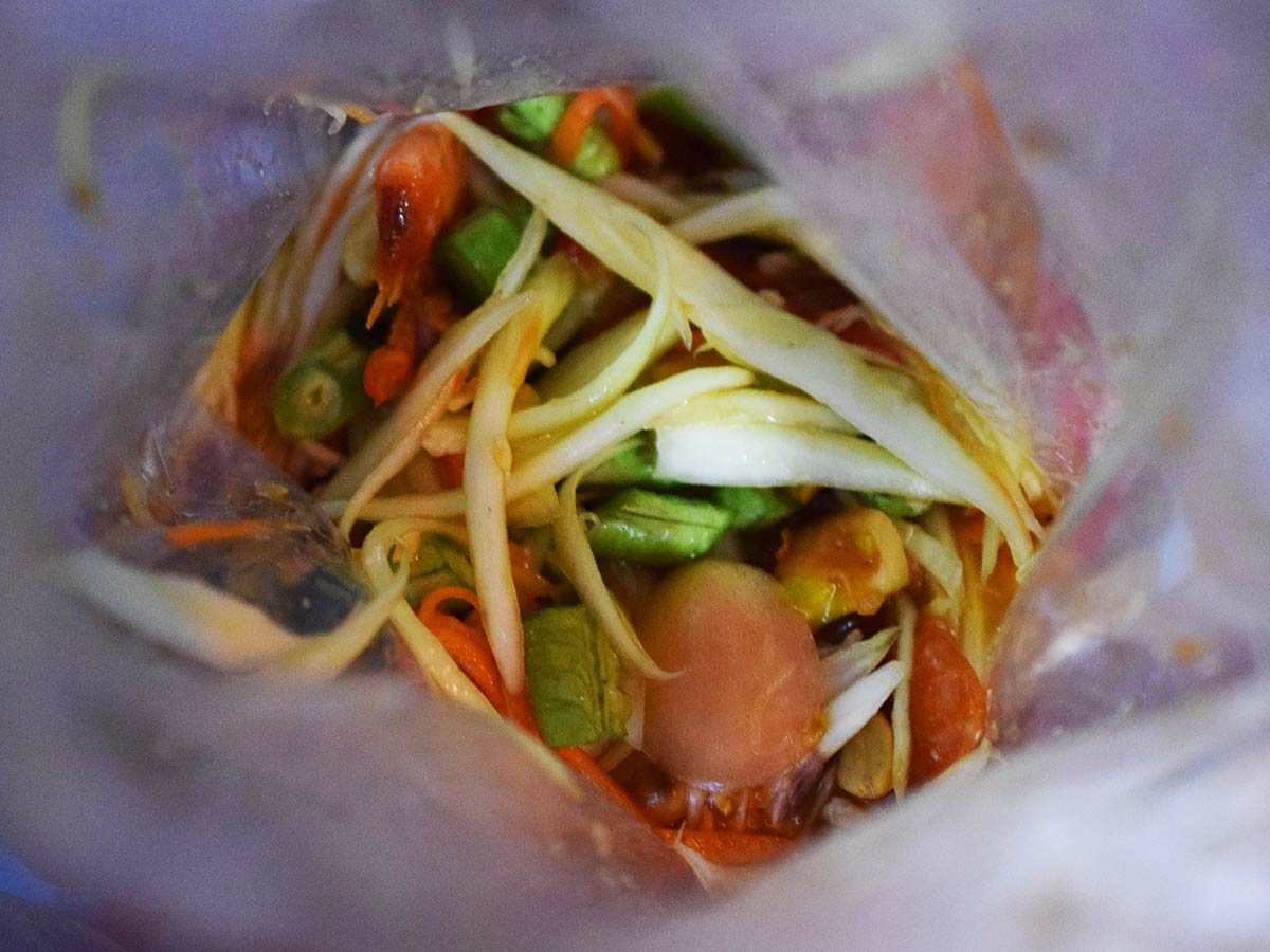 bangkok street food papaya salad in a bag the food quest
