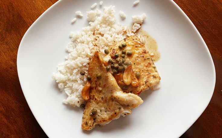 lemon caper butter cod piccata served over rice